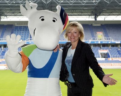 German TV-moderator Ulla Kock am Brink with mascot Allwin